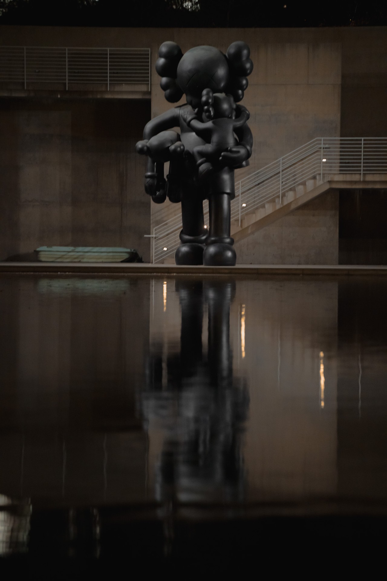 KAWS sculpture — reflection study