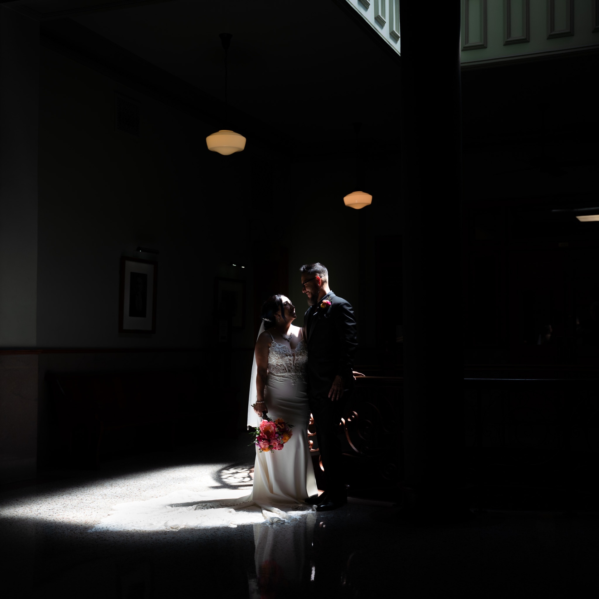 Wedding portrait — light through the corridor